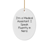 Medical Assistant Gifts from Friends, Cute Oval Ornament with 'I'm A Medical Assistant. I Speak Fluently In genius.' Quote, Perfect Christmas Unique Gifts for Medical Assistant - Image 1